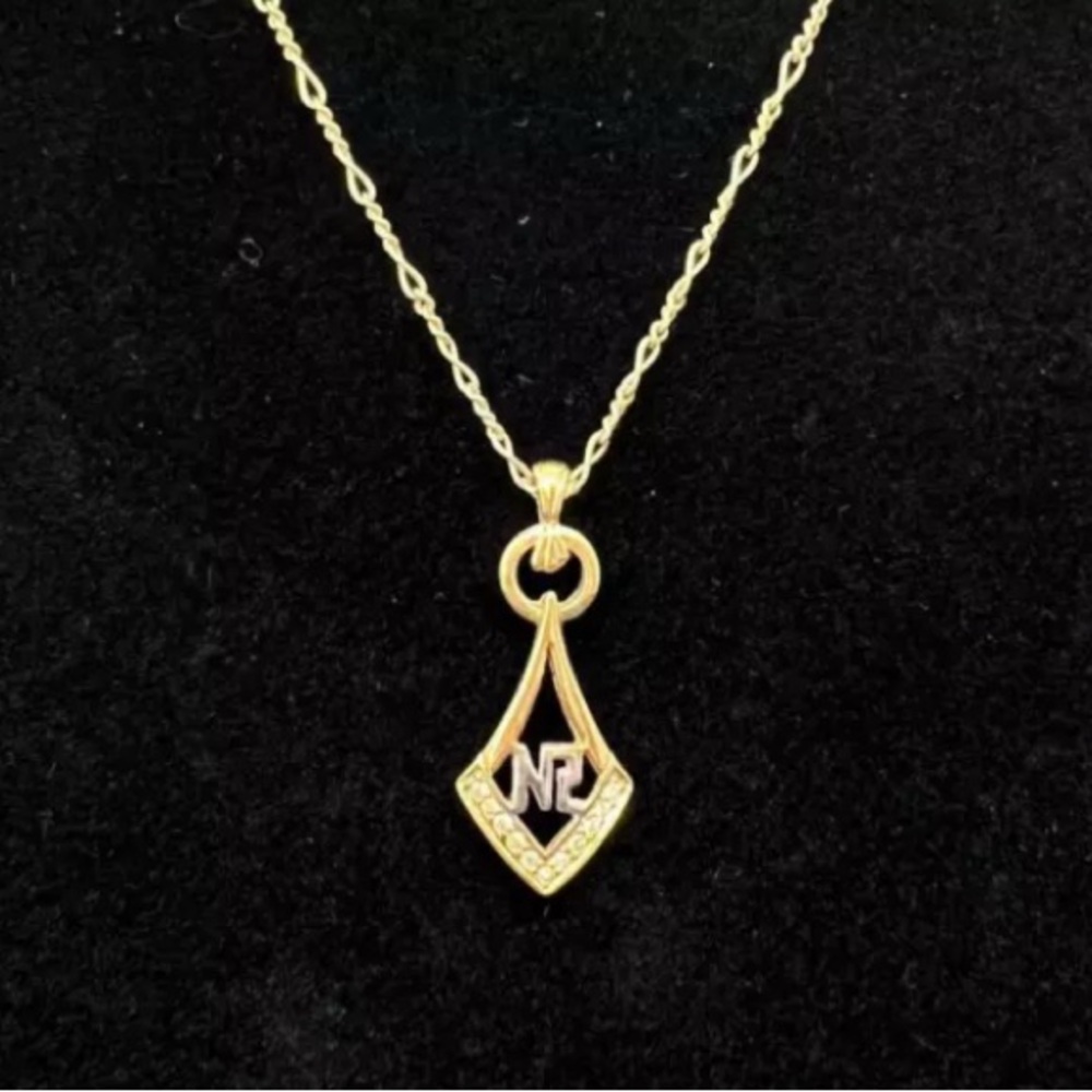 Nina Ricci vintage gold color and rhinestone  necklace